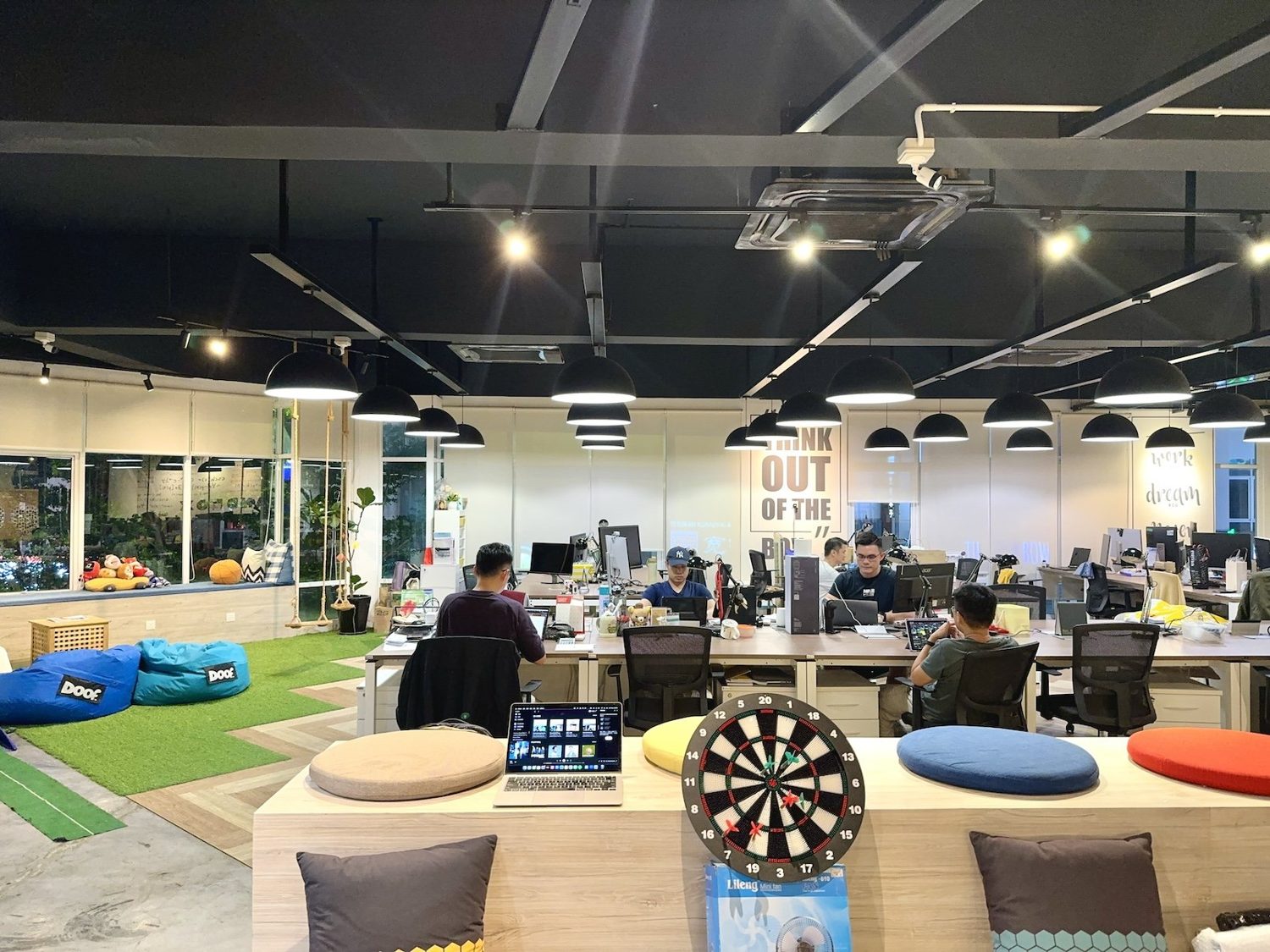 Member working at night inside Sandbox Space with 24/7 keyless access