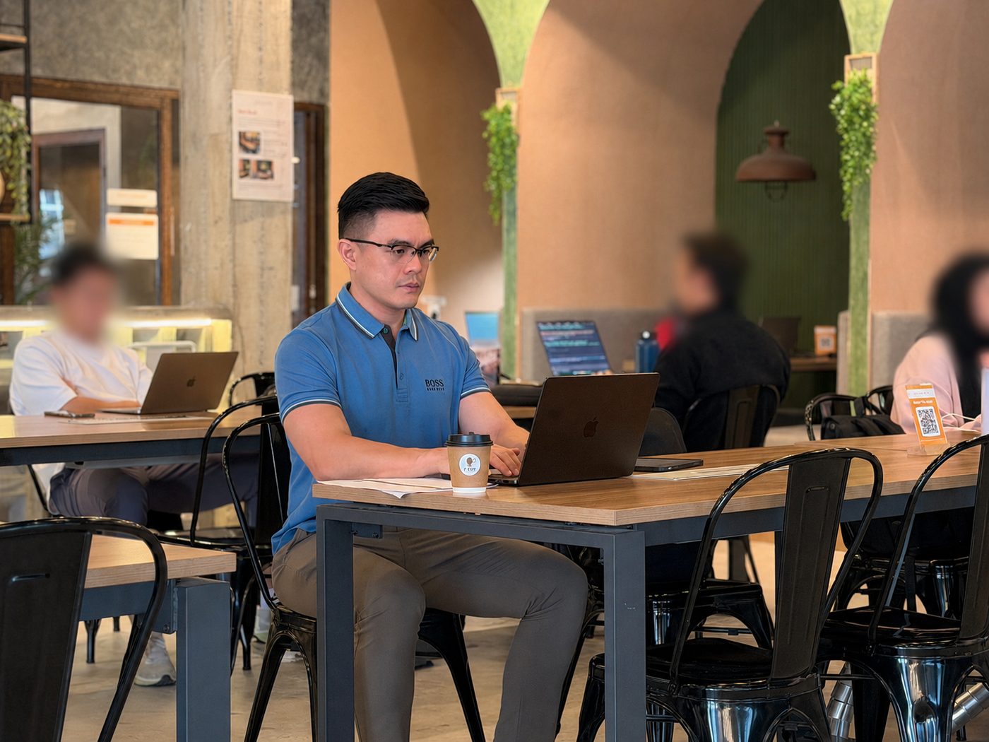 Members working on the open coworking floor at Sandbox Space in Kuala Lumpur