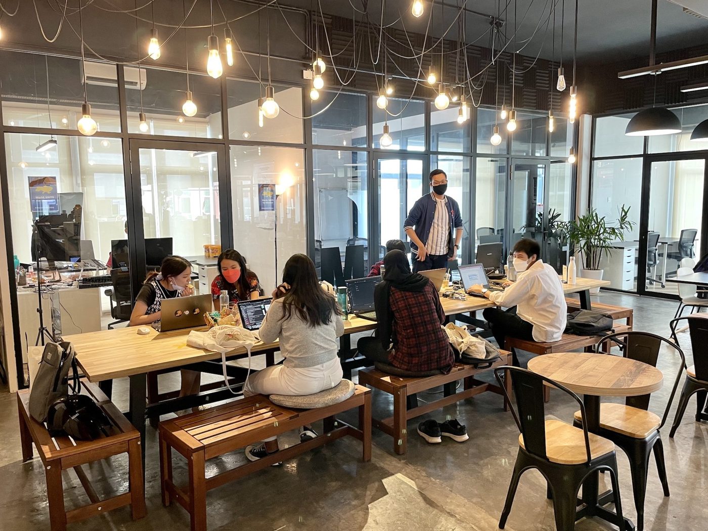 Day pass members on the open coworking floor at Sandbox Sri Petaling